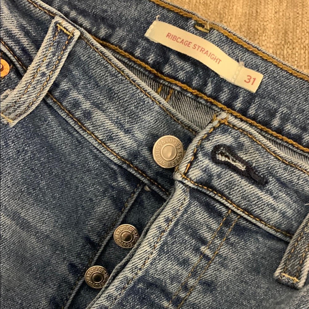 Levi's Blue Straight Leg Jeans with Button Fly and Rivets